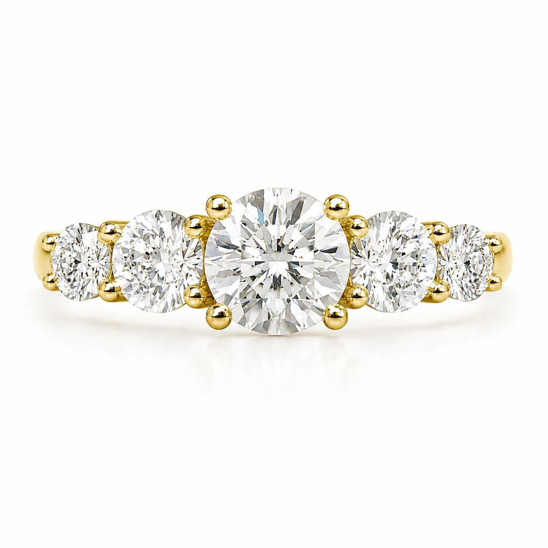 Five Stone Natural Diamond Ring in yellow gold featuring graduated round brilliant natural diamonds, clean front view on white background
