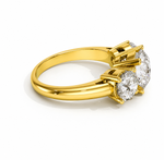 Load image into Gallery viewer, Three-stone round lab-grown diamond ring in yellow gold, side view
