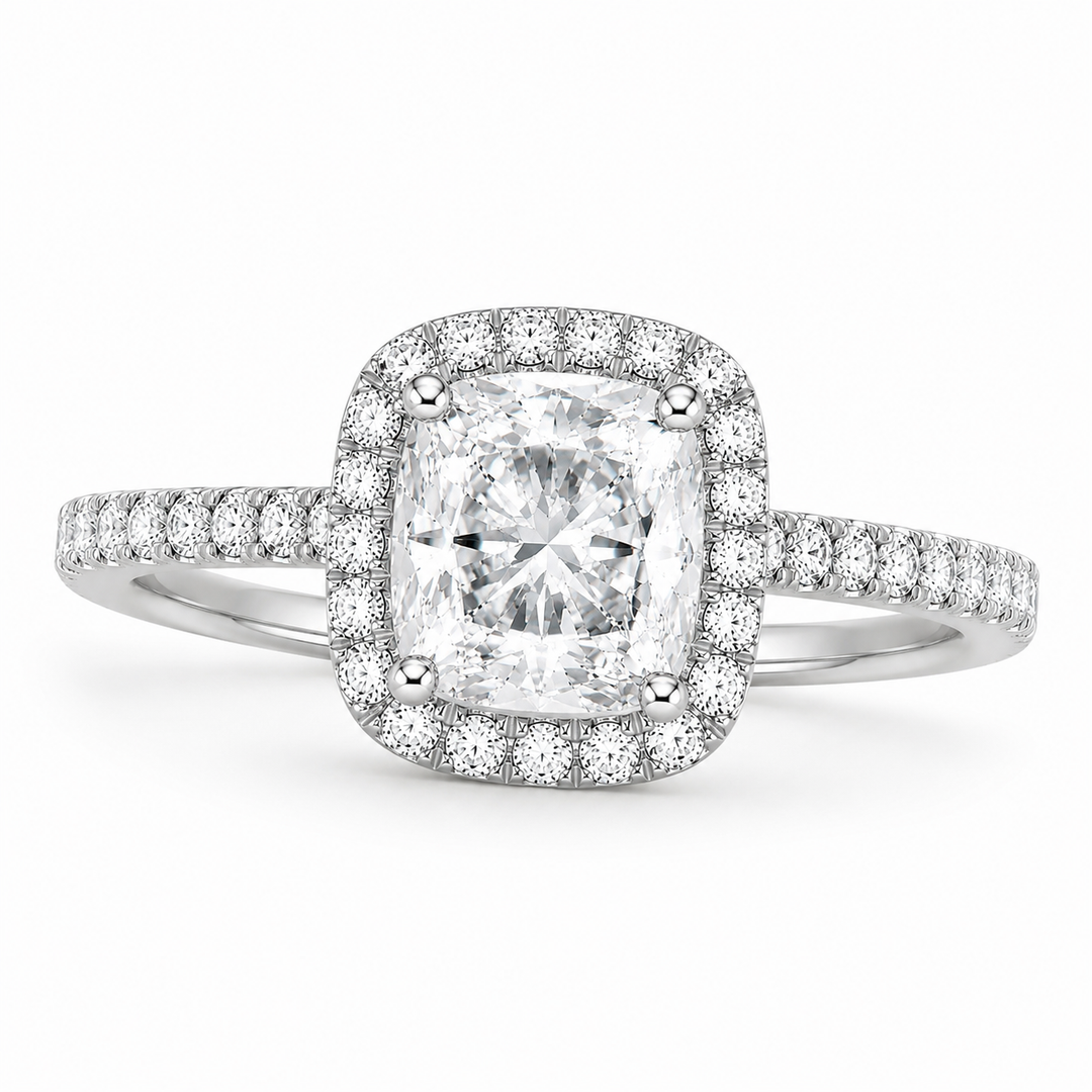     Cushion halo natural diamond engagement ring in white gold, front view with pavé diamonds.