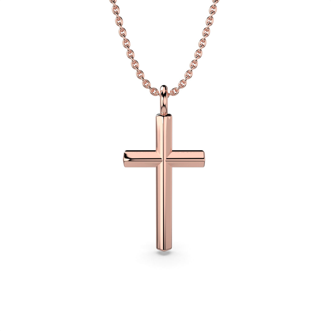 Rose gold cross necklace on a chain