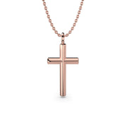 Rose gold cross necklace on a chain