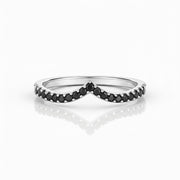 Black diamond V-shaped wedding band in white gold, curved chevron design with pavé-set black diamonds