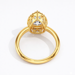 Load image into Gallery viewer, Back view of Pear Halo Biza lab-grown diamond ring showcasing the biza gallery and smooth yellow gold band
