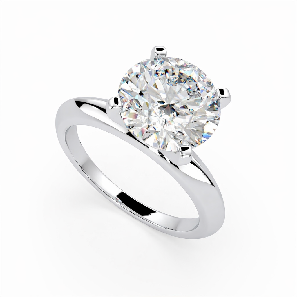 Round lab grown diamond solitaire ring in white gold, angled view showing classic prong setting