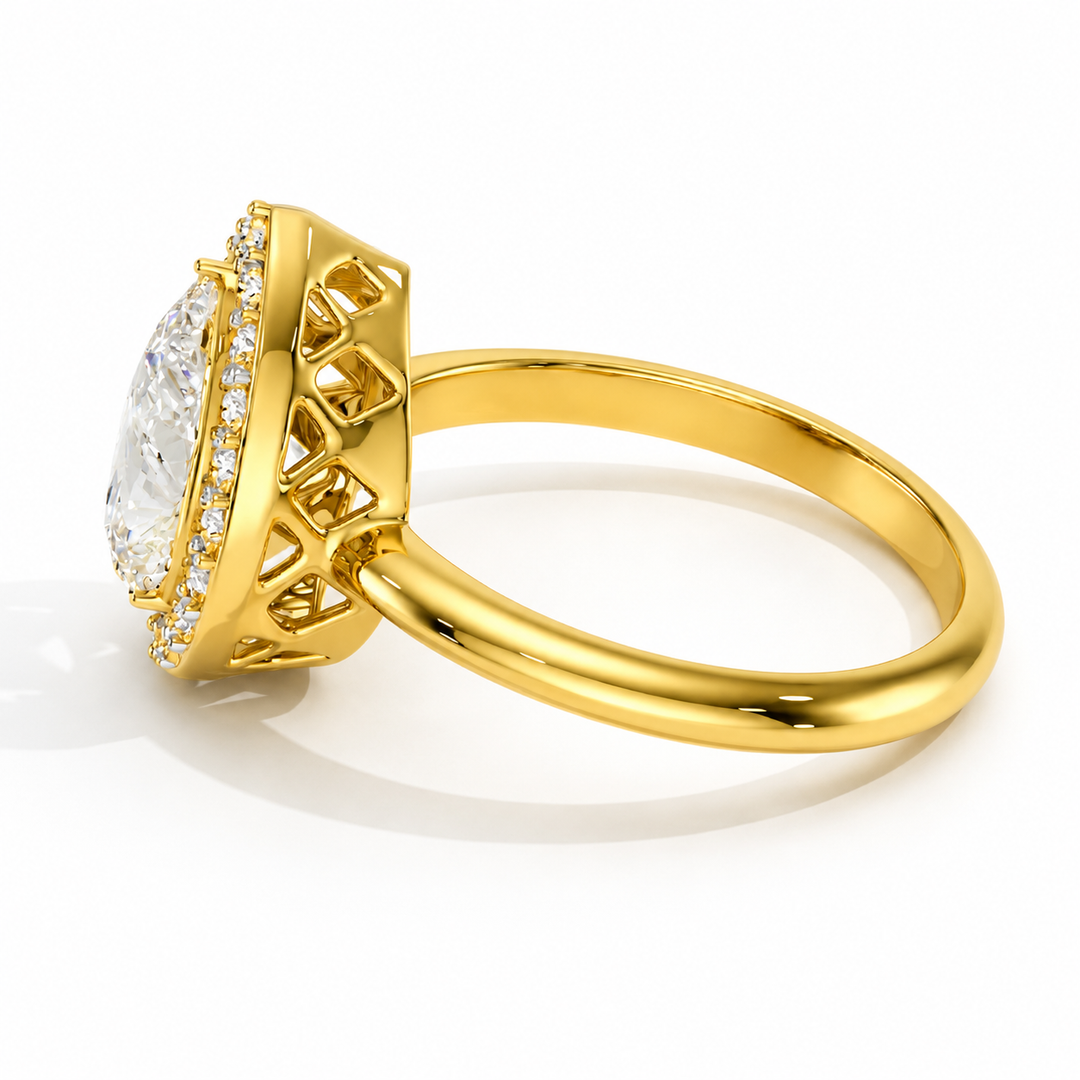 Pear halo Biza natural diamond ring side view showing halo setting and band in yellow gold 