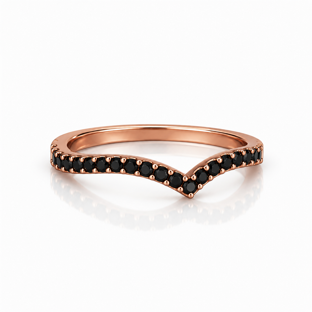 Side view of black diamond V-shaped ring in rose gold, curved pavé band with black diamonds