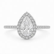 Natural pear halo diamond ring in 14K white gold featuring a pear-shaped center diamond surrounded by a halo of natural diamonds.