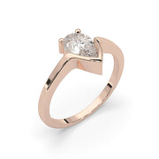 Side view of Fifty Fifty natural pear shape diamond ring showing fifty-fifty bezel and prong design in rose gold