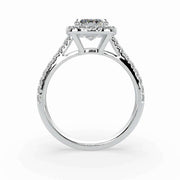 Profile view of emerald cut natural diamond halo ring in white gold, showcasing the elevated center stone and pavé band