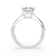 Emerald cut natural diamond solitaire engagement ring in white gold, side profile
