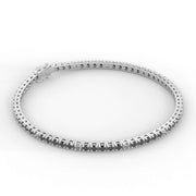 Natural black & white diamond tennis bracelet, round cut diamonds, white gold, side angle