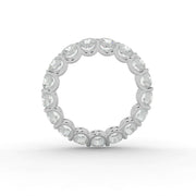 Angled view of full eternity natural diamond ring in white gold with round cut diamonds