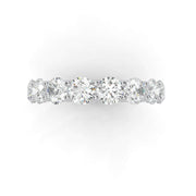 Round-cut lab-grown diamond full eternity ring, close-up side view