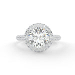 Load image into Gallery viewer, a diamond engagement ring with a halo setting
