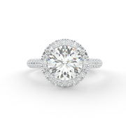 a diamond engagement ring with a halo setting