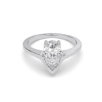 Load image into Gallery viewer, a white gold ring with a pear shaped diamond
