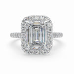 Load image into Gallery viewer, an emerald cut diamond ring with a halo halo halo halo halo halo halo halo halo
