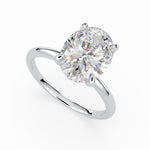 Load image into Gallery viewer, a round cut diamond ring on a white background
