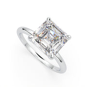 a diamond engagement ring with a princess cut diamond